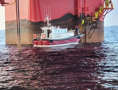 a boat is docked in the water