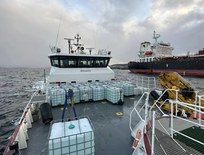 a large container of water on a boat