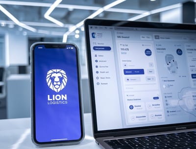 a laptop and a phone with a lion on the screen