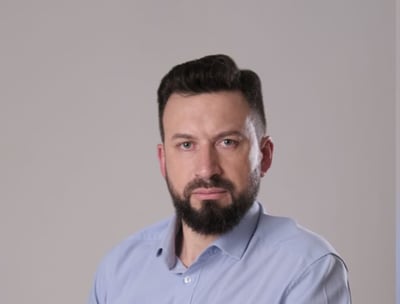 a man with a beard and a beard