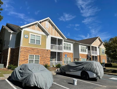 Exterior painting service on multi-family apartment building in Douglas, GA by Garnet Painting & Remodeling.