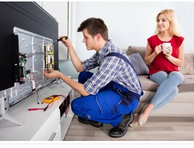 TV repair technician diagnosing power issues in Patna