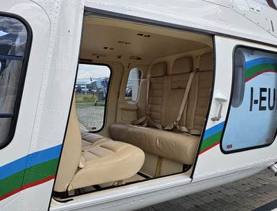 Agusta AW119Kx Koala VIP helicopter with luxury seating and Garmin avionics.