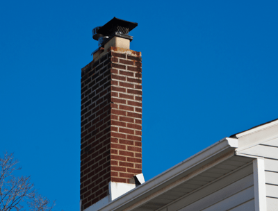 Brick chimney with cover