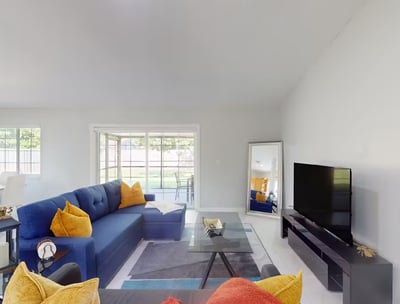 a living room with a couch and a television