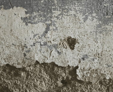 spalling damaged corroded concrete member