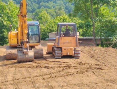 excavator and dozer getting ready to work