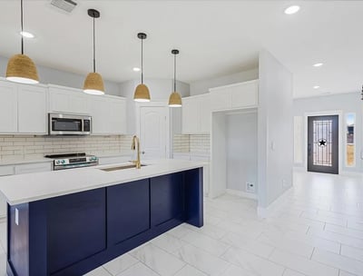 a kitchen with a large island