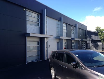 a car parked in front of a building