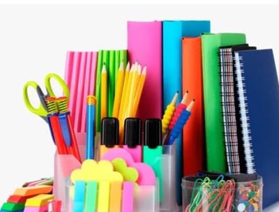 a bunch of school supplies including pens, pencils, and markers
