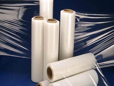 a bunch of plastic wrappers on a blue background