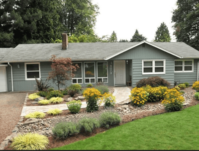 a house with a driveway and driveway with a driveway