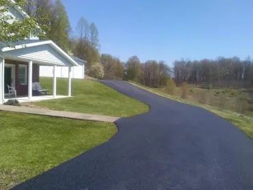 Residential asphalt driveway paving in West Virginia – smooth, durable, and long-lasting.