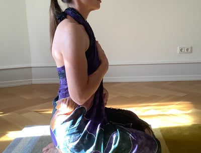 woman sitting in meditation