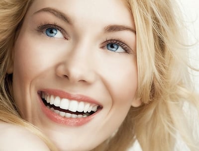 a woman with blonde hair and blue eyes