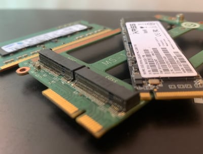 a couple of ram modules are sitting on a table
