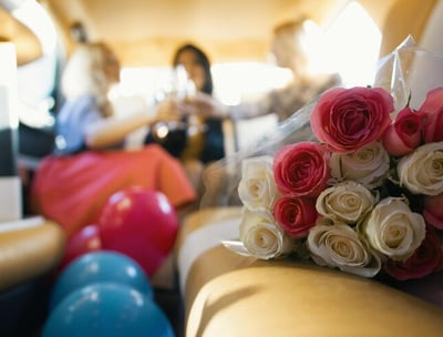 Group loading into a limo for prom
