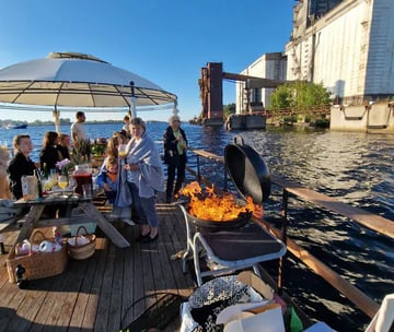 a group of people on the party raft Riga