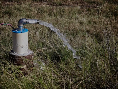a water hose is being used to collect water