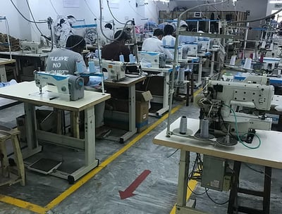 Advanced automated machinery producing high-performance tactical uniforms.