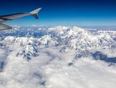The tallest mountains in the Himalayan Mountain Range, with Mt. Everest. The view from the airplane