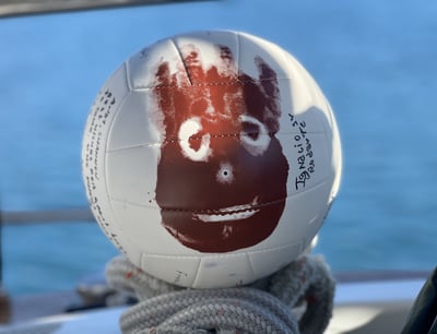 a soccer ball with a printed hand on it