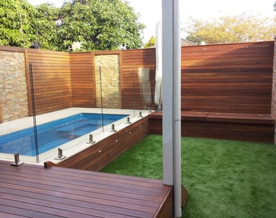 Spotted gum screen and bench with stone inserts