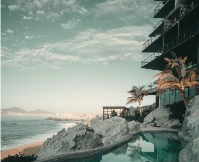 a pool with a view of a beach