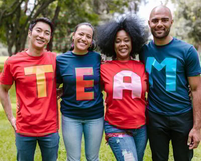 Family with TEAM printed T-shirts