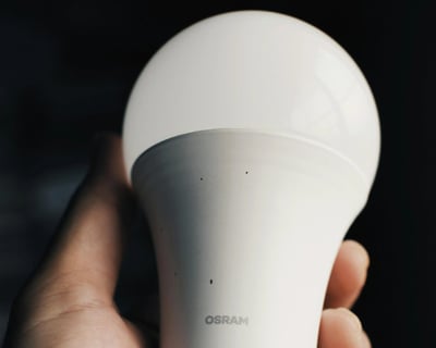 Stock image of LED bulb to represent energy-efficient lighting upgrades