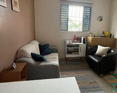a living room with a couch and a table