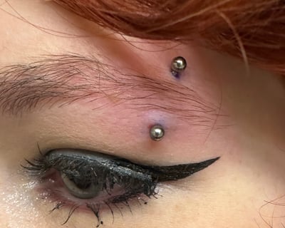 Eyebrow piercing