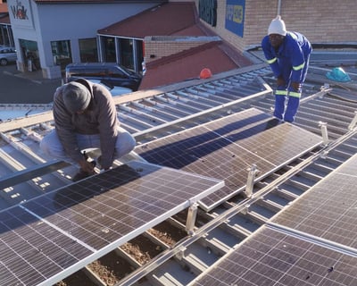 Careful removal of solar panels for commercial roof project