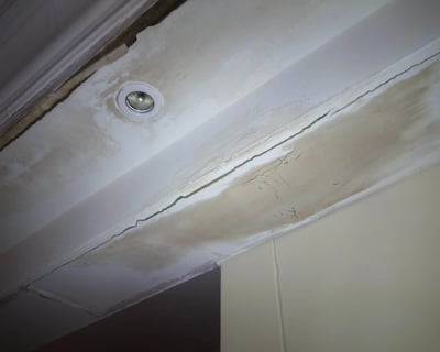 Ceiling damage from leaking roof, Environmental Pro Construction