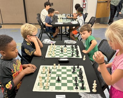 Children playing at a chess tournament at the Henderson Multi-Gen Rec Center in NV