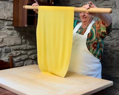 Alessandra Spisni making handmade sfoglia, a timeless craft of Emilia-Romagna cuisine