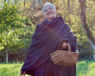 Alessandra Spisni in the Bolognese countryside, showcasing Emilia-Romagna's culinary heritage