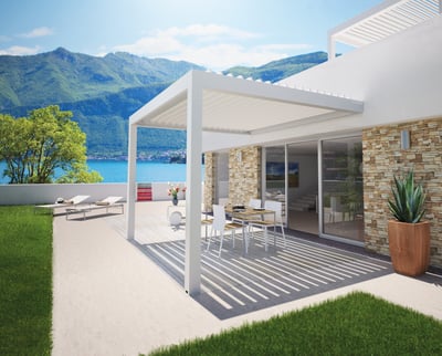 a patio with a table and chairs and a table