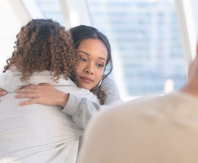 A light worker hugging and offering support and healing