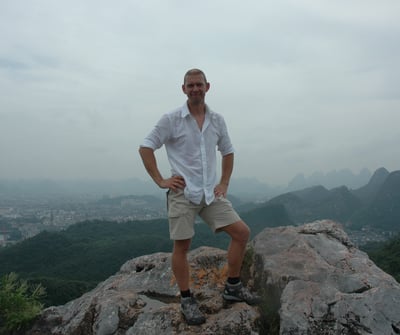 Nick and Tracey Billington climbing the hills above the city of Guilin, China