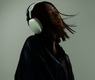 a woman with a noise canceling headphones 