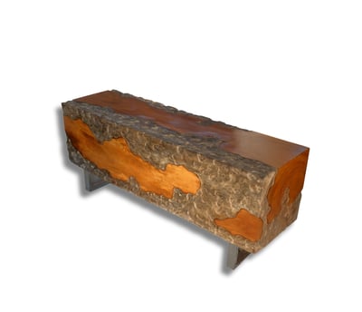 a wooden bench with a stone accent