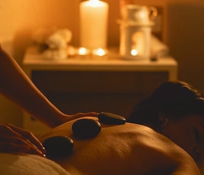 a man getting a massage at a spa