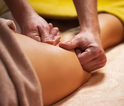 a person is getting a massage at a massage