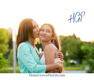 mom hugging teen daughter