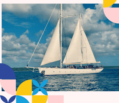 a sailboat sailing on the ocean