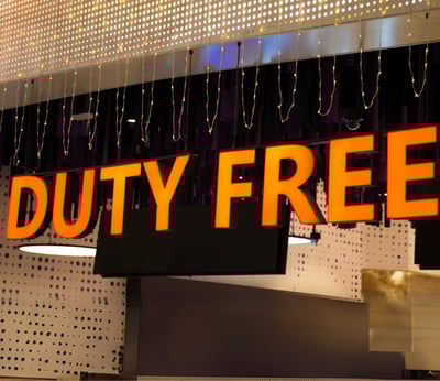 a sign that says duty free on a storefront