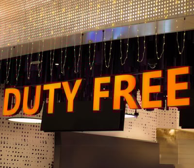 a sign that says duty free on a storefront