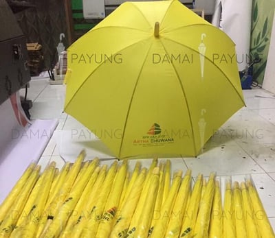 Payung promosi polos standard kuning artha bhuwana