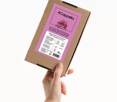 hand holding craft box with colored home scent label